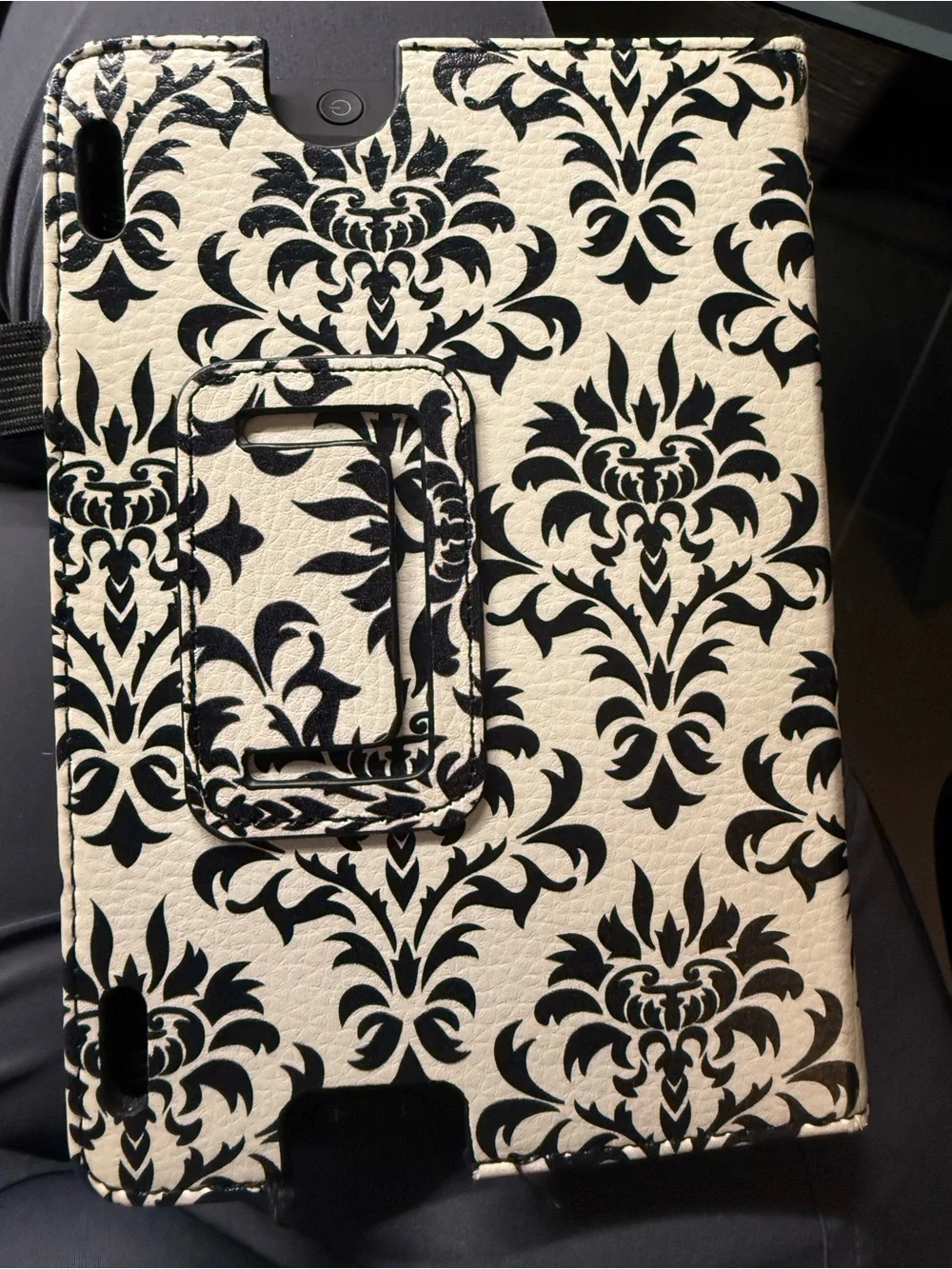 Amazon Kindle Fire tablet (generation 3) with black textured folio case